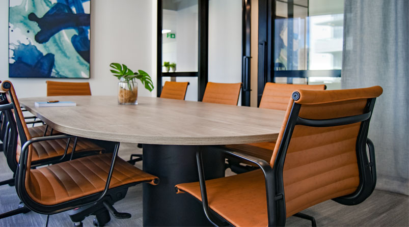 company board room orange office chairs